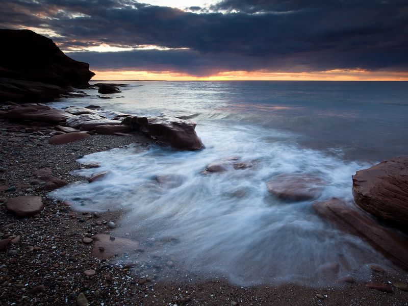 ocean surf at sunset, Prince Edward Island National Park, Cavendish, Canada